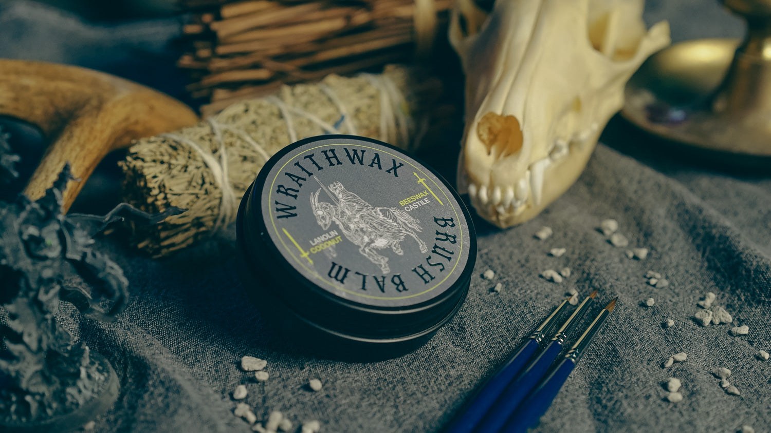 Graveforge — Wraithwax tin, skull, and sable brushes by candlelight