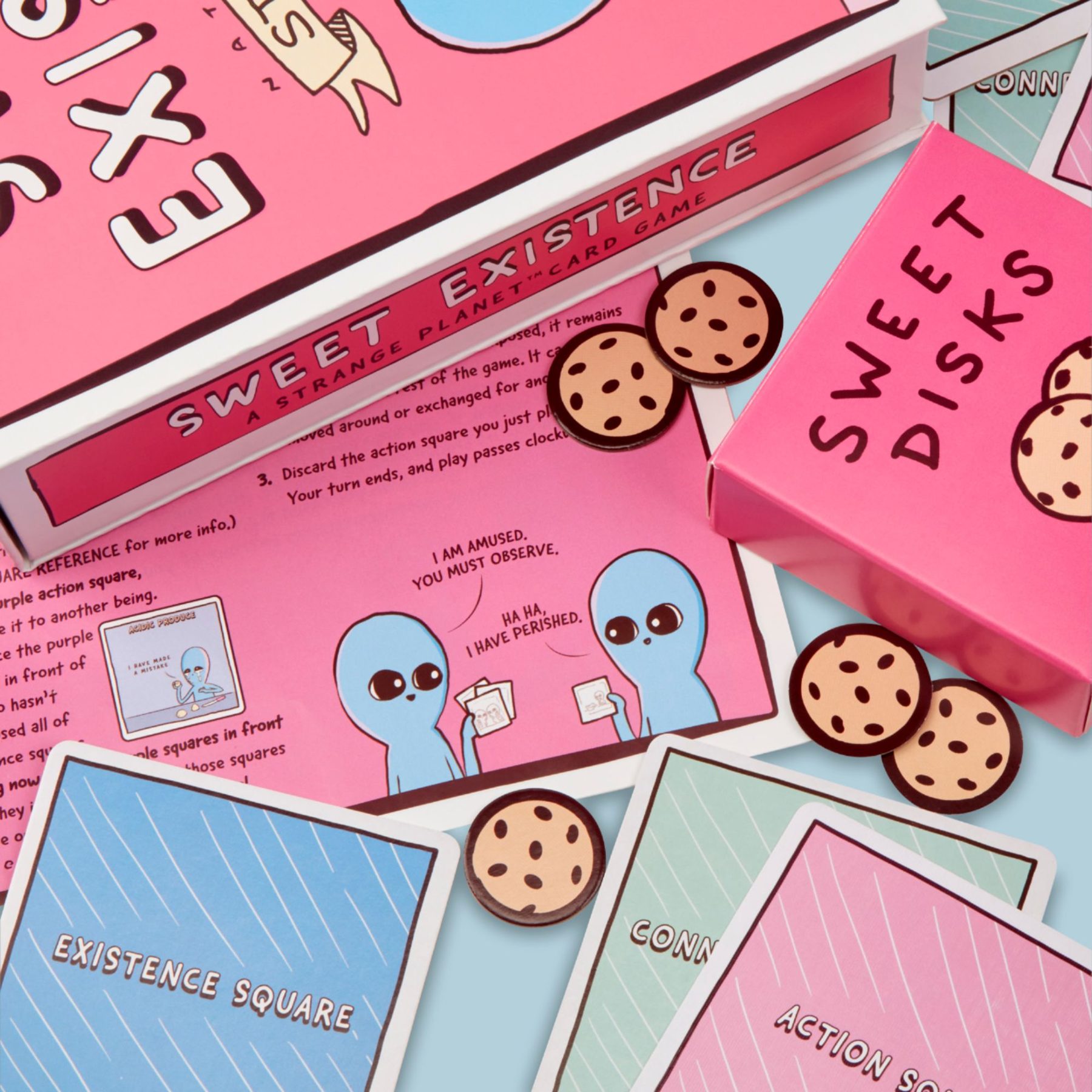 Sweet Existence — the Strange Planet card game, box, cards and cookie tokens